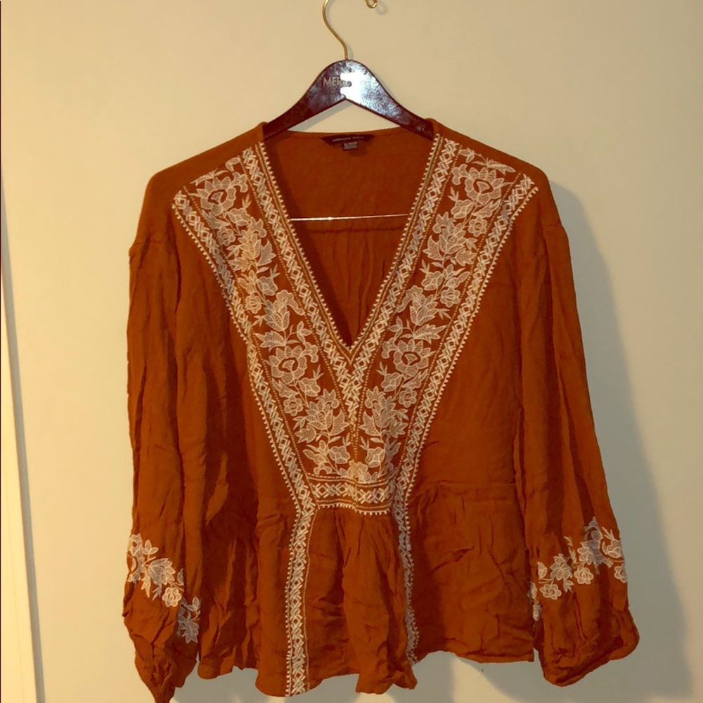 American Eagle embroidered bohemian peplum top.